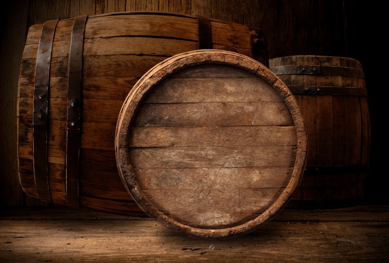 Whiskey barrel on its side top facing